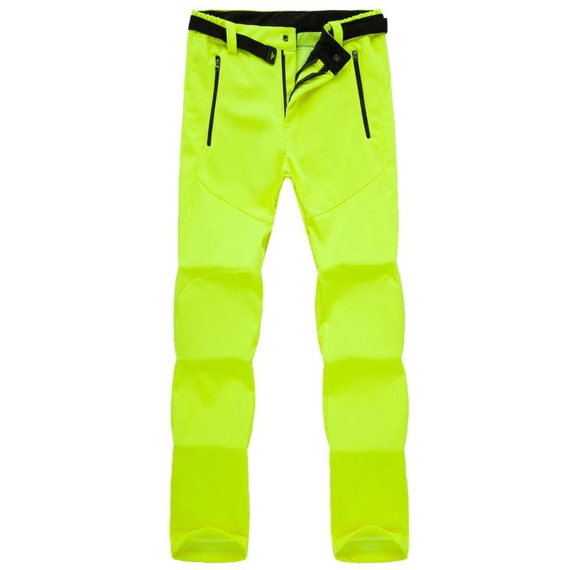 Women's outdoor hiking pants in neutral tone, straight cut with weather-resistant fabric for trail activities