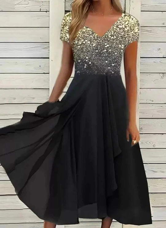 Women's elegant off-shoulder party dress in flowing fabric with refined silhouette for formal occasions