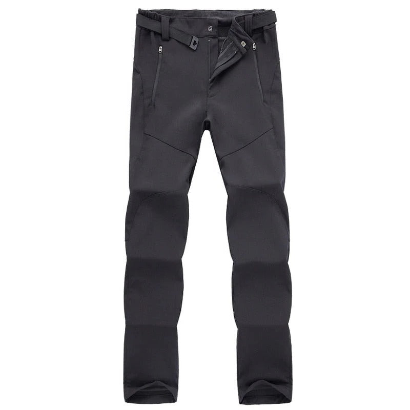 Women's outdoor hiking pants in neutral tone, straight cut with weather-resistant fabric for trail activities
