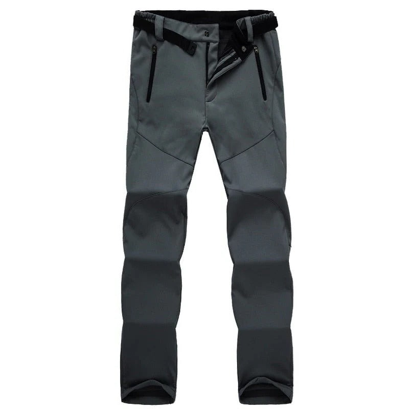 Women's outdoor hiking pants in neutral tone, straight cut with weather-resistant fabric for trail use