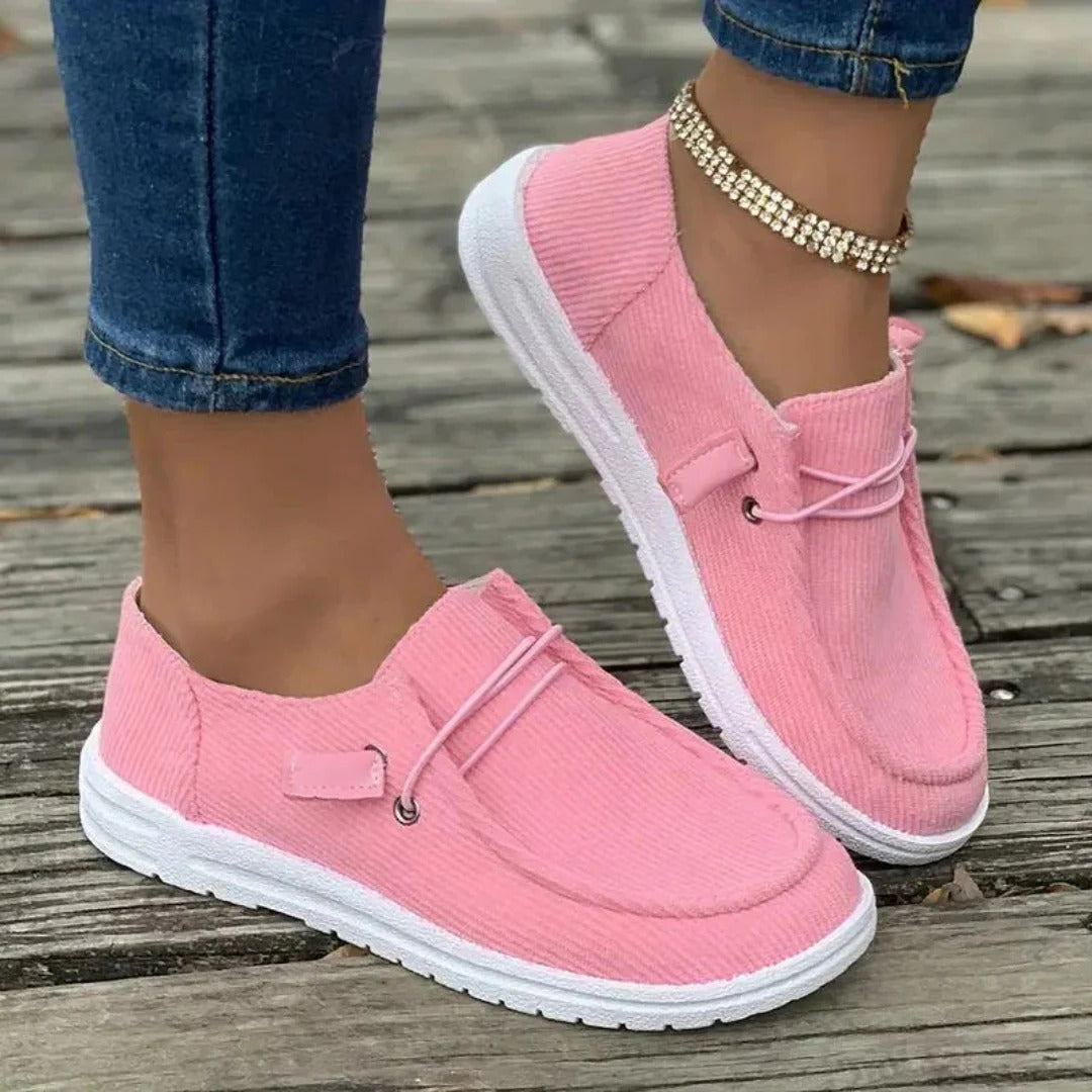 Women's slip-on hiking boots in neutral tones, relaxed fit with easy-wear design for outdoor comfort