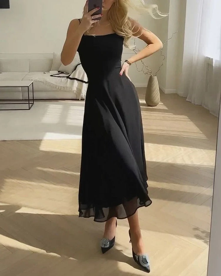 Sleeveless square neckline elegant dress in neutral tone, flowing silhouette for day-to-night occasions
