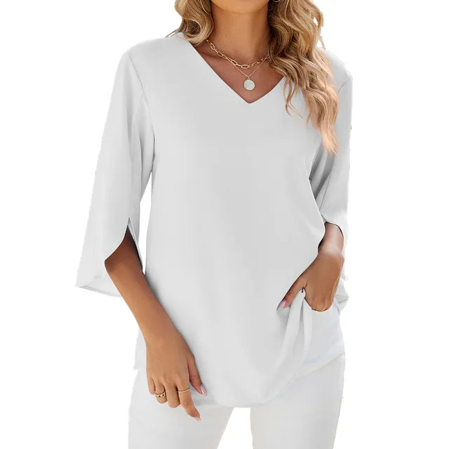 Women's white lightweight V-neck blouse with airy fabric and relaxed elegant silhouette