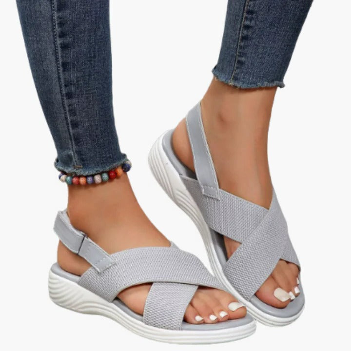 Women's open-toe comfort sandals with adjustable straps, breathable upper, modern silhouette for warm weather