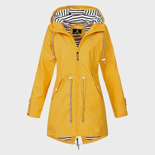 Women's long waterproof hooded rain jacket with extended coverage for all-weather protection