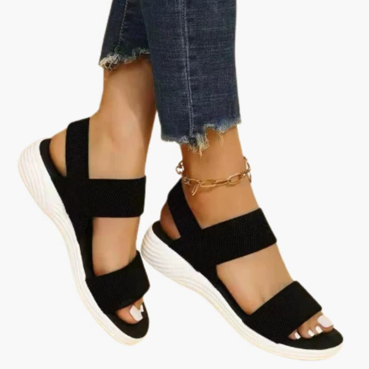 Women's open-toe comfort sandals with adjustable straps, breathable upper, modern silhouette for warm weather