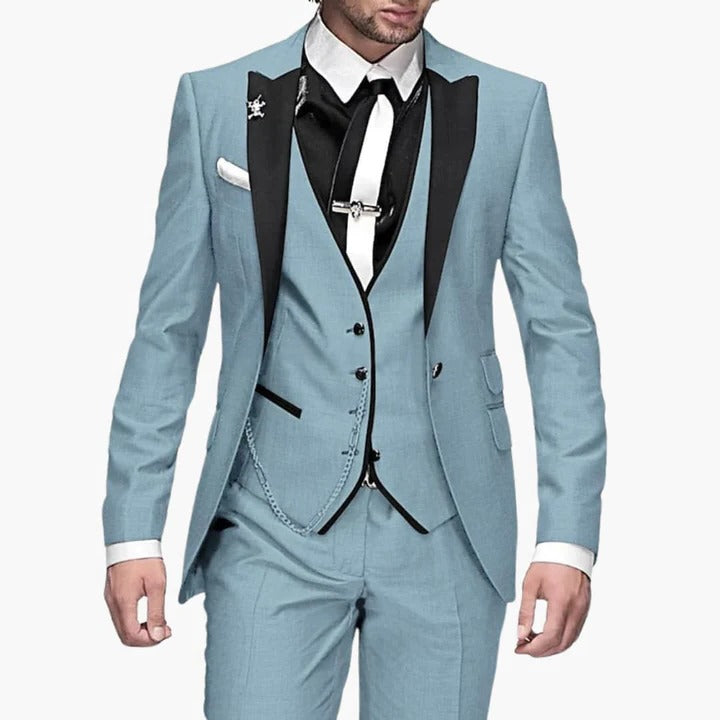 Men's burgundy three-piece tailored suit with black lapels, vest, and trousers by Wavlynn
