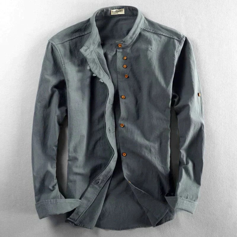 Men's white collarless Japanese-style shirt with structured fit and minimalist detailing