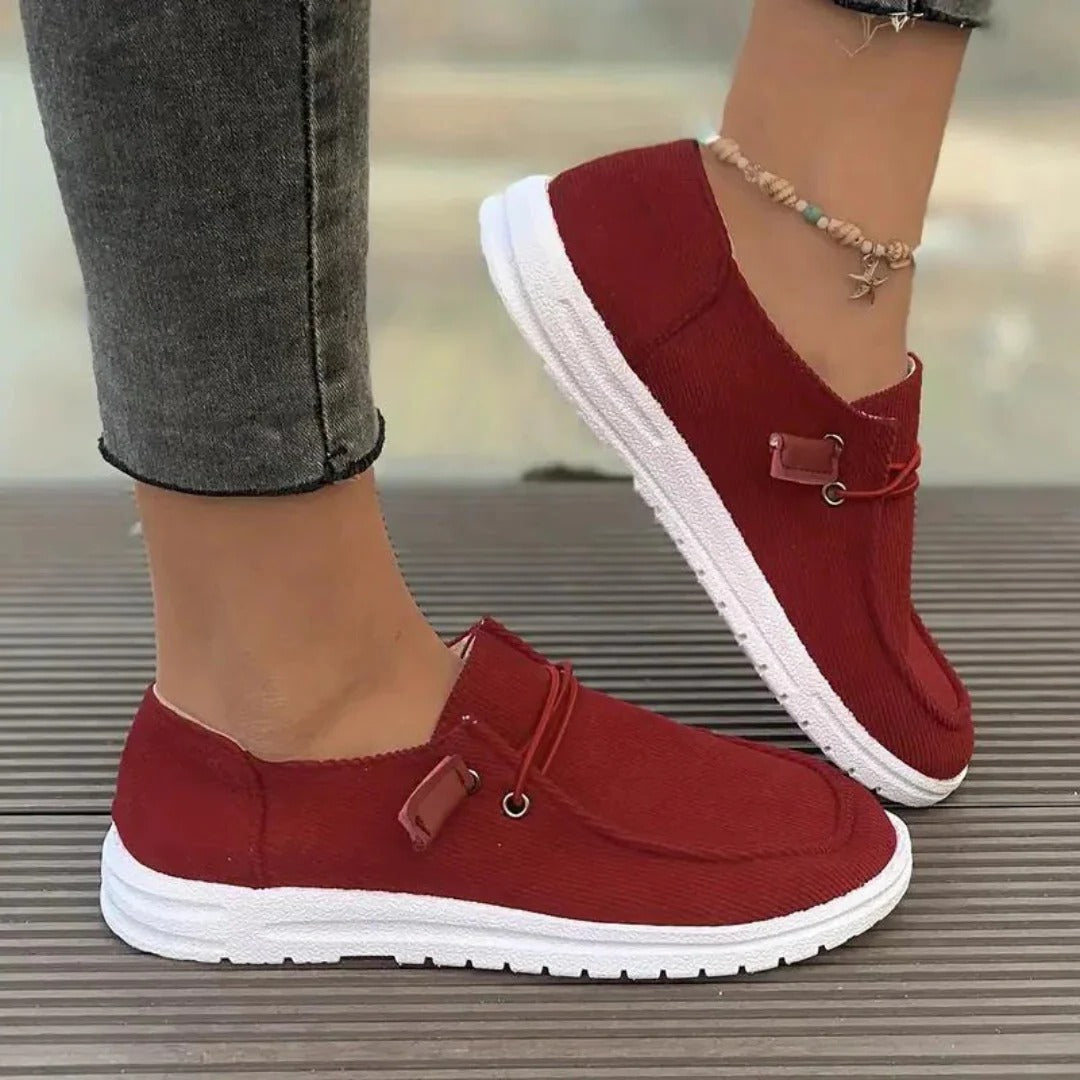 Women's slip-on hiking boots in neutral tones, relaxed fit with easy-on design for outdoor wear