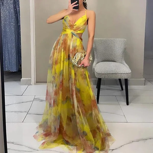 Breezy sleeveless maxi summer dress in flowing silhouette with adjustable back closure for effortless fit
