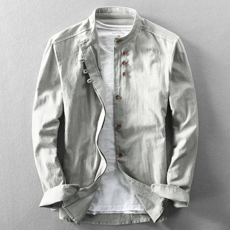 Men's white collarless Japanese-style shirt with structured fit and minimal detailing