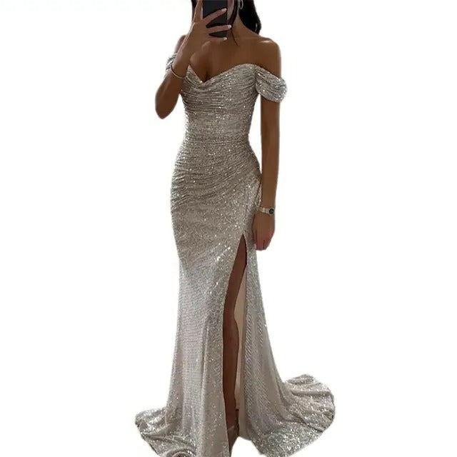 Black sequin off-shoulder maxi dress with slim tailored silhouette and side slit for formal elegance