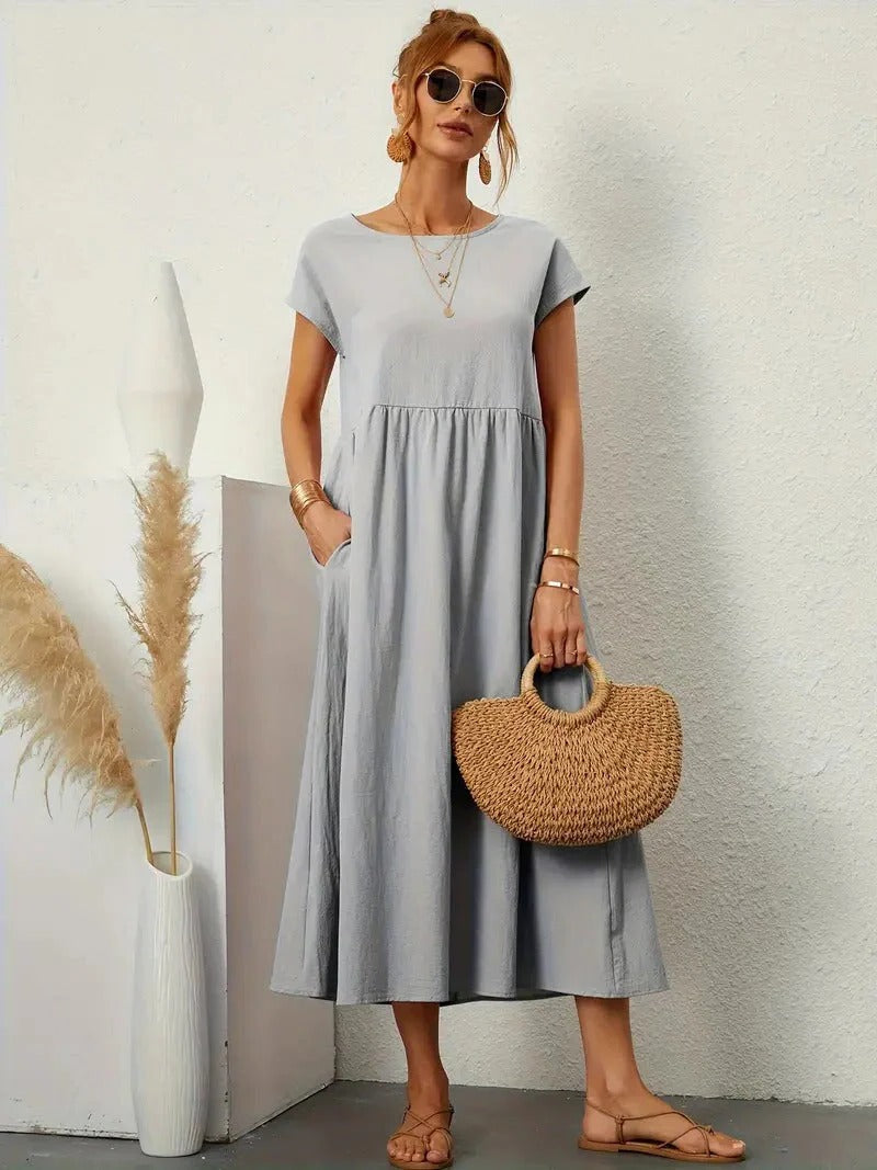 Forest-green elegant women's dress with pockets, lightweight drape fabric, refined silhouette for day to evening