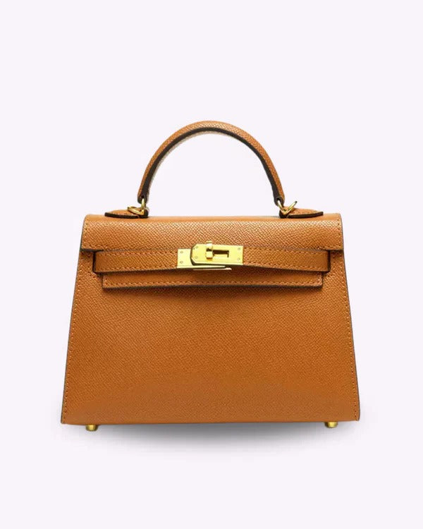 Structured mini handbag with gold twist-lock clasp, compact design for formal and everyday use