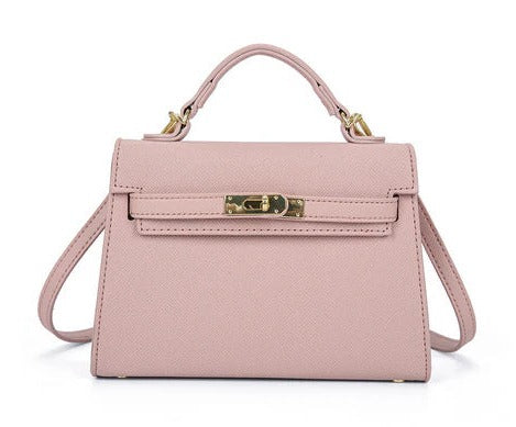 Structured mini handbag with gold twist-lock clasp, compact design for formal and everyday use