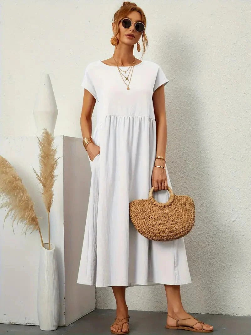 Forest-green elegant women's dress with pockets, lightweight drape fabric, refined silhouette for day-to-evening wear