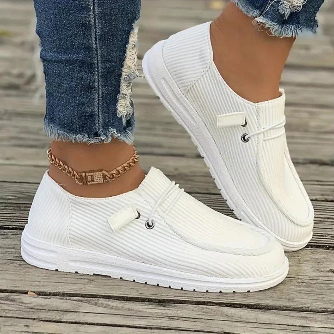 Women's slip-on hiking boots in neutral tones, relaxed fit with easy-wear design for outdoor use