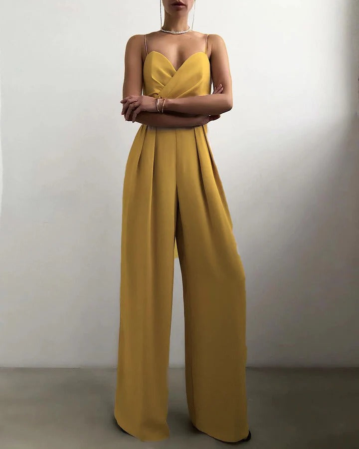 Women's sleeveless jumpsuit with shaped waist, structured silhouette, elegant minimalist everyday chic