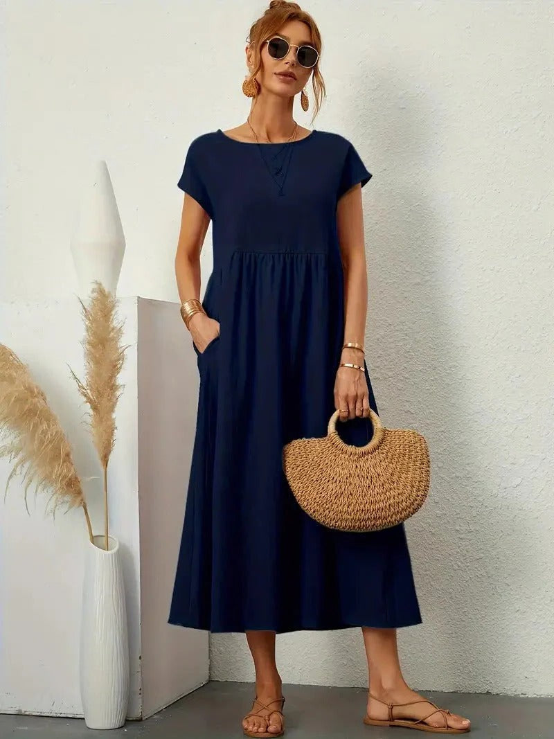 Forest-green elegant women's dress with pockets, lightweight drapable fabric, refined silhouette for day to evening