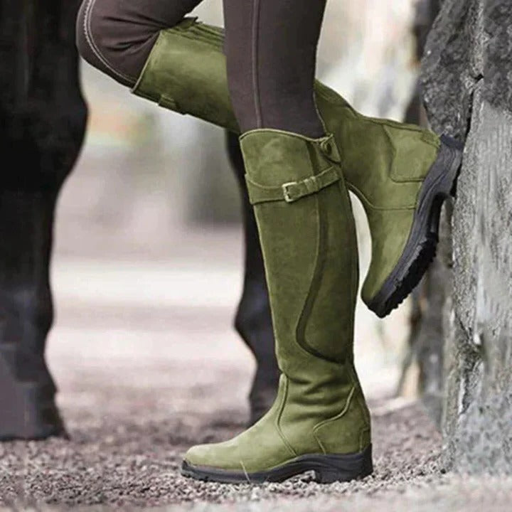 Women's black high-top waterproof boots with minimalist design and elevated ankle silhouette