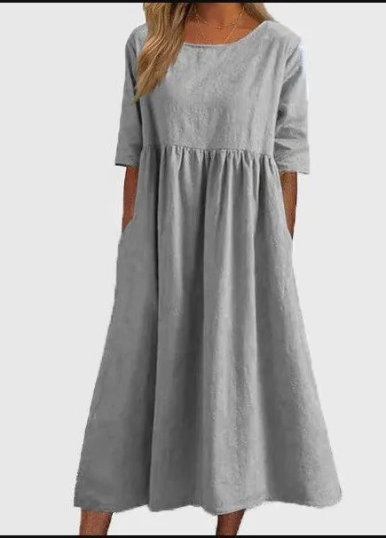 Norah floral spring midi dress in pastel tones with flowy A-line silhouette and sleeveless design