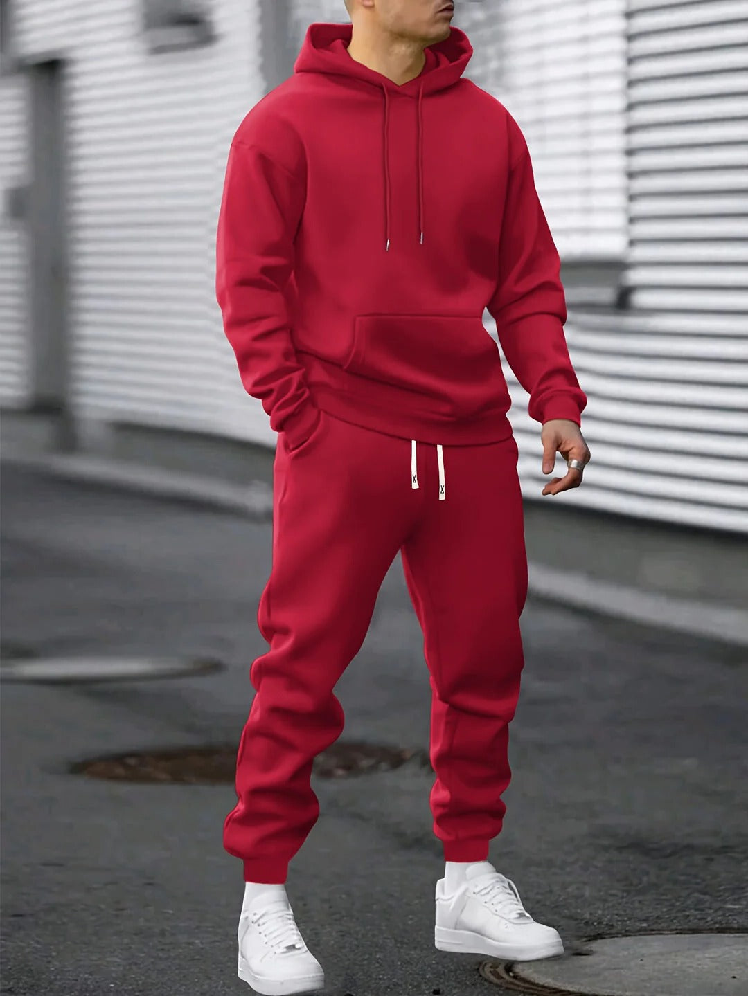 Men's grey fleece hoodie and jogger tracksuit set with matching two-piece athletic design