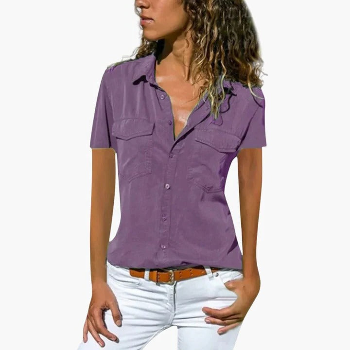 Charcoal grey women's short sleeve button-down blouse with shirt collar and twin chest pockets