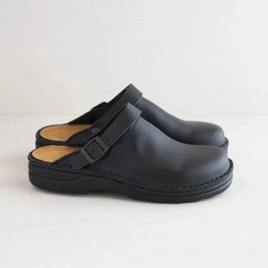 Men's closed-toe slippers with structured footbed, neutral tones, supportive sole for indoor outdoor use