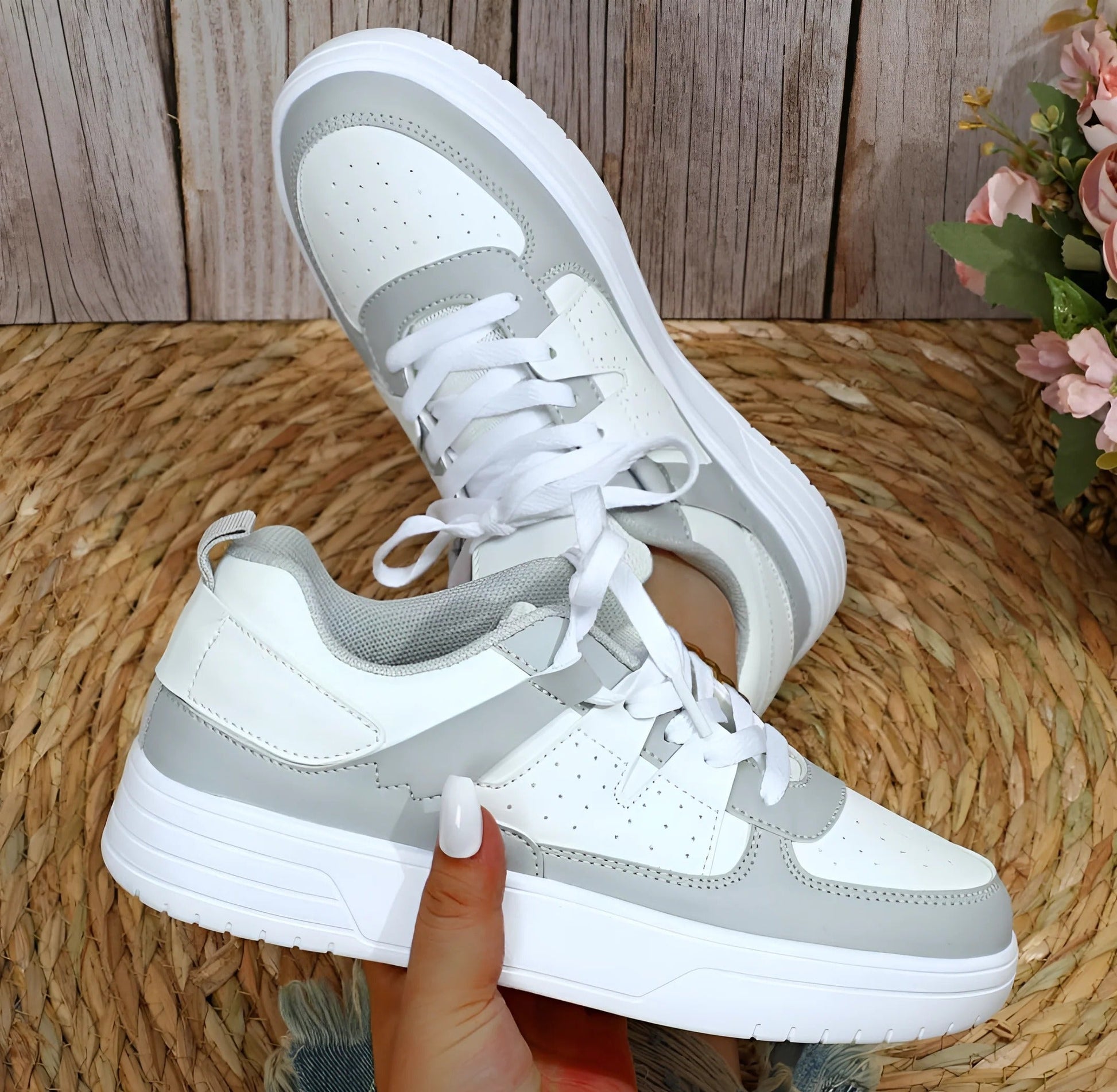 Women's low-cut closed-toe daily sneakers in neutral tones with streamlined silhouette for all-day comfort