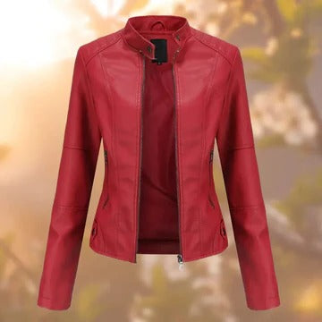 Women's black stand-collar jacket with metallic detailing and structured modern silhouette