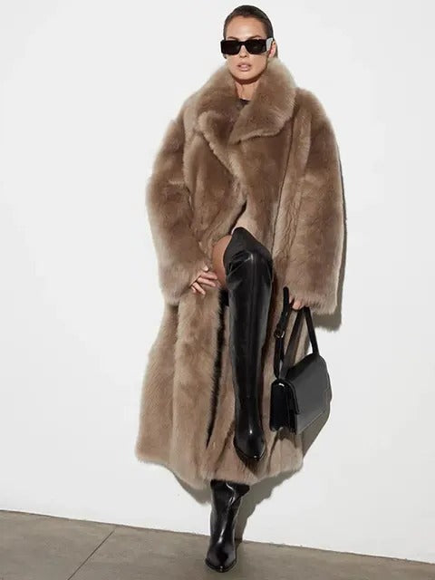 Beige long-cut structured winter trench coat with relaxed layer-friendly fit for cold seasons