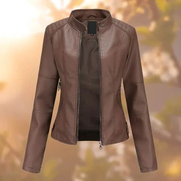 Women's stand-collar jacket in neutral tone with metallic accents and structured modern silhouette
