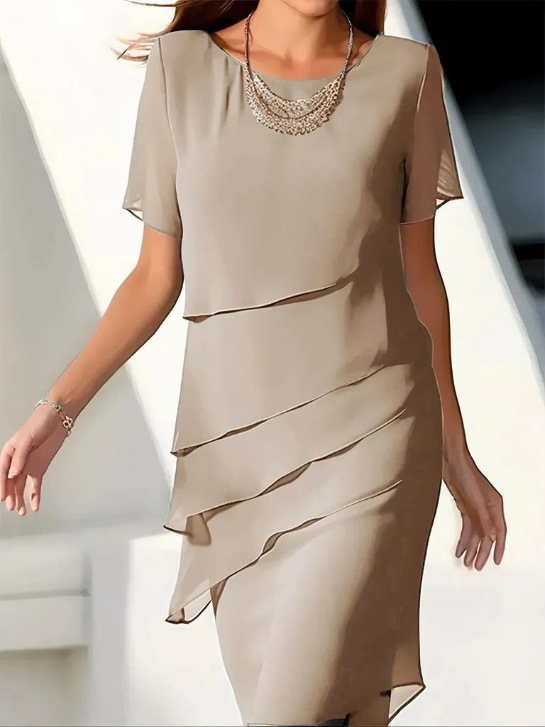 Black slimming dress with tailored body-skimming silhouette and structured panel-aligned shaping for elegant fit