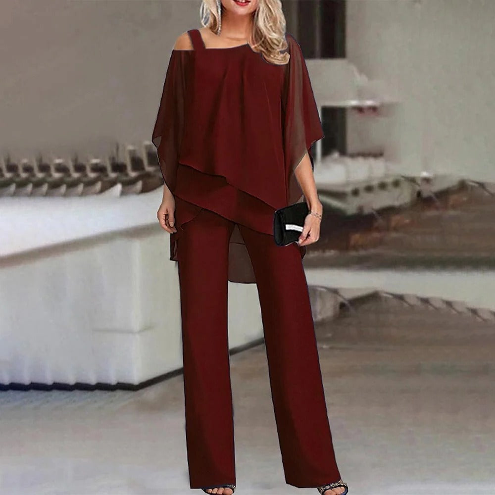 Women's cold shoulder wide leg jumpsuit in chiffon overlay, elegant flowing silhouette for special occasions