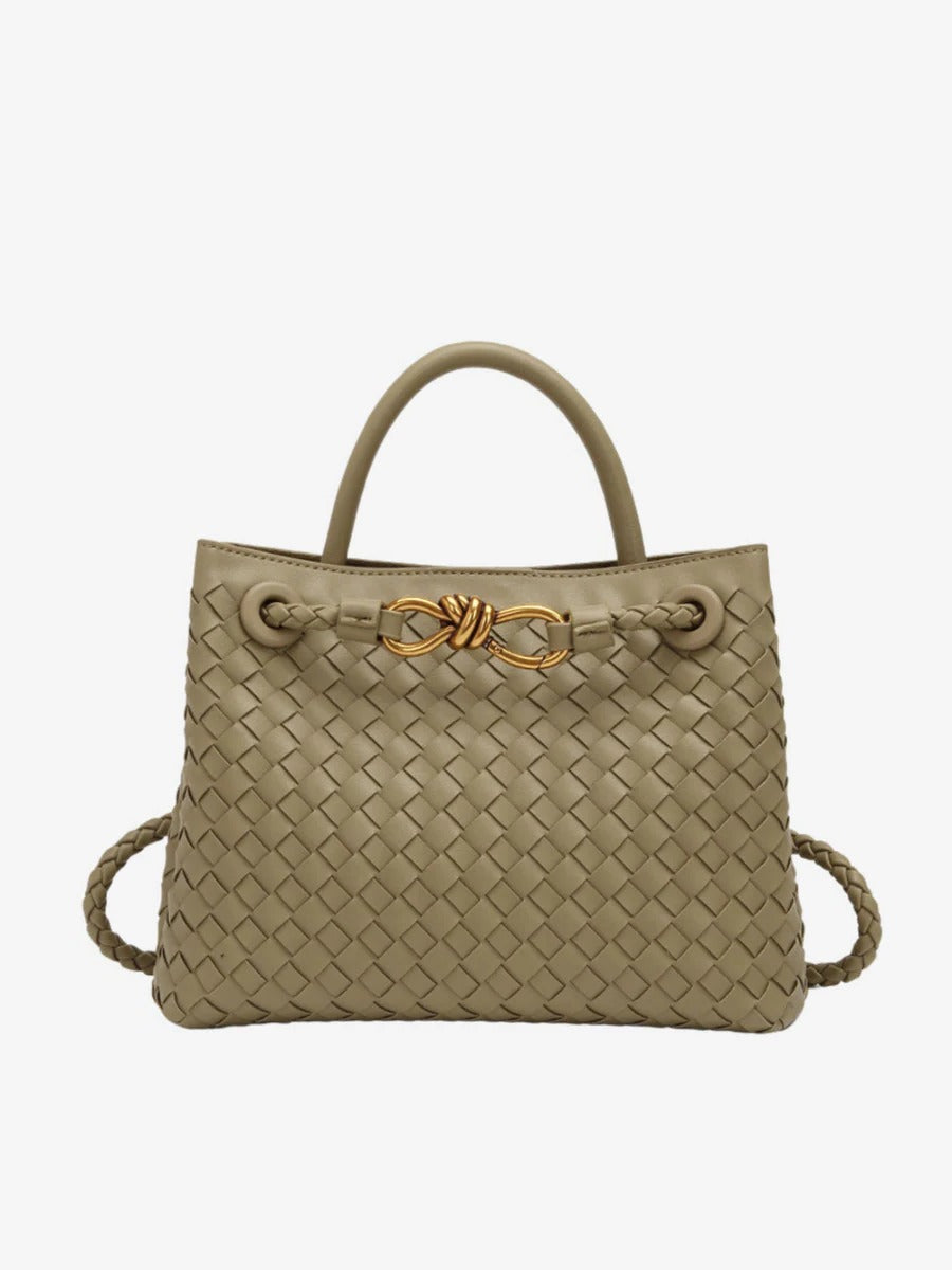Black structured woven tote bag with dual carry straps and gold knot accent, everyday versatile handbag