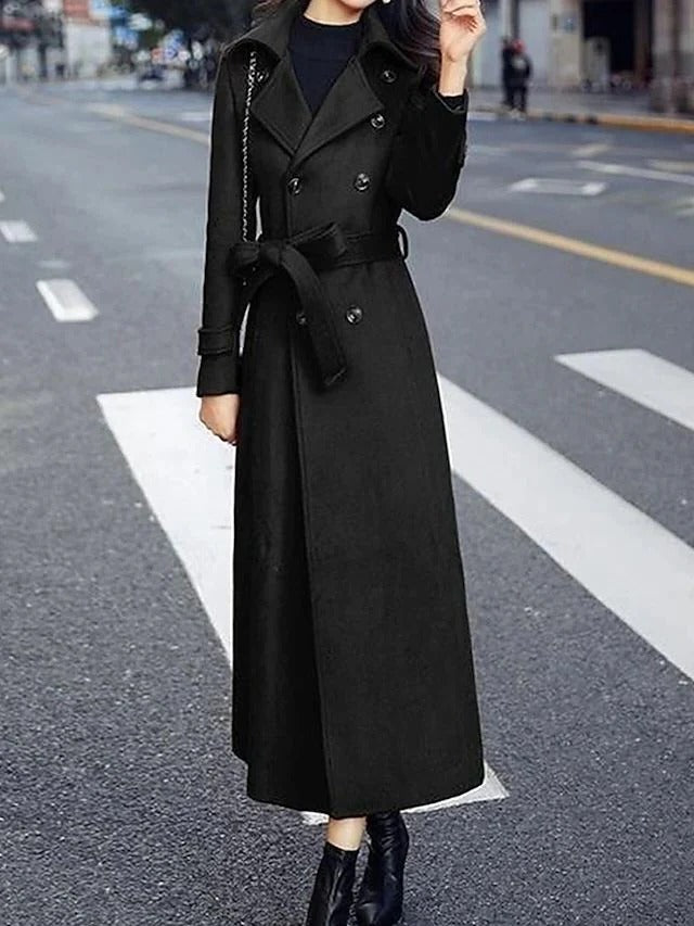 Women's long belted winter coat with notched lapel, classic silhouette, cold weather outerwear