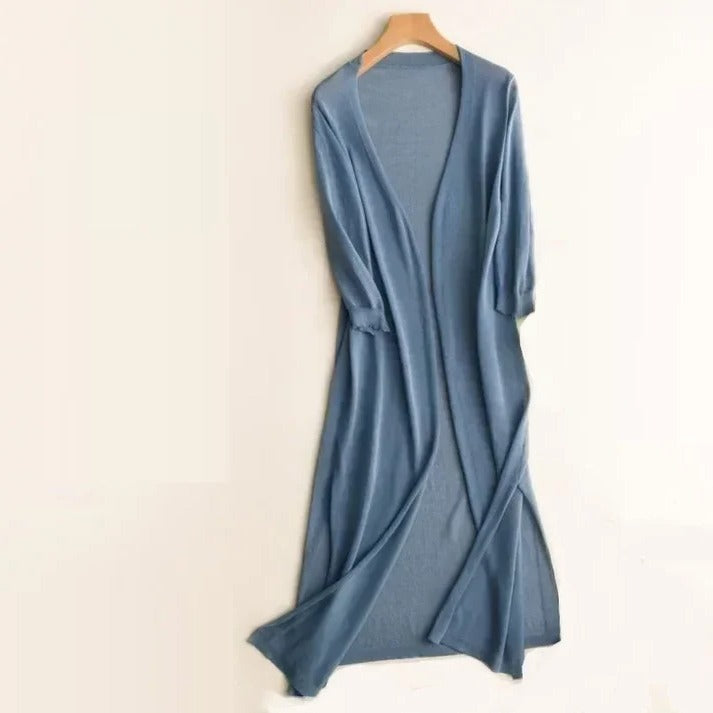 Women's long open-front cardigan in soft neutral knit, elegant drape for work-to-weekend layering