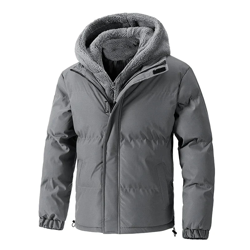 Black quilted puffer hoodie with bold sherpa-lined hood, dual zipper closure, and cinched cuffs