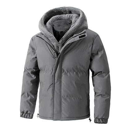 Black quilted puffer hoodie with bold sherpa-lined hood, dual zipper closure, and cinched cuffs