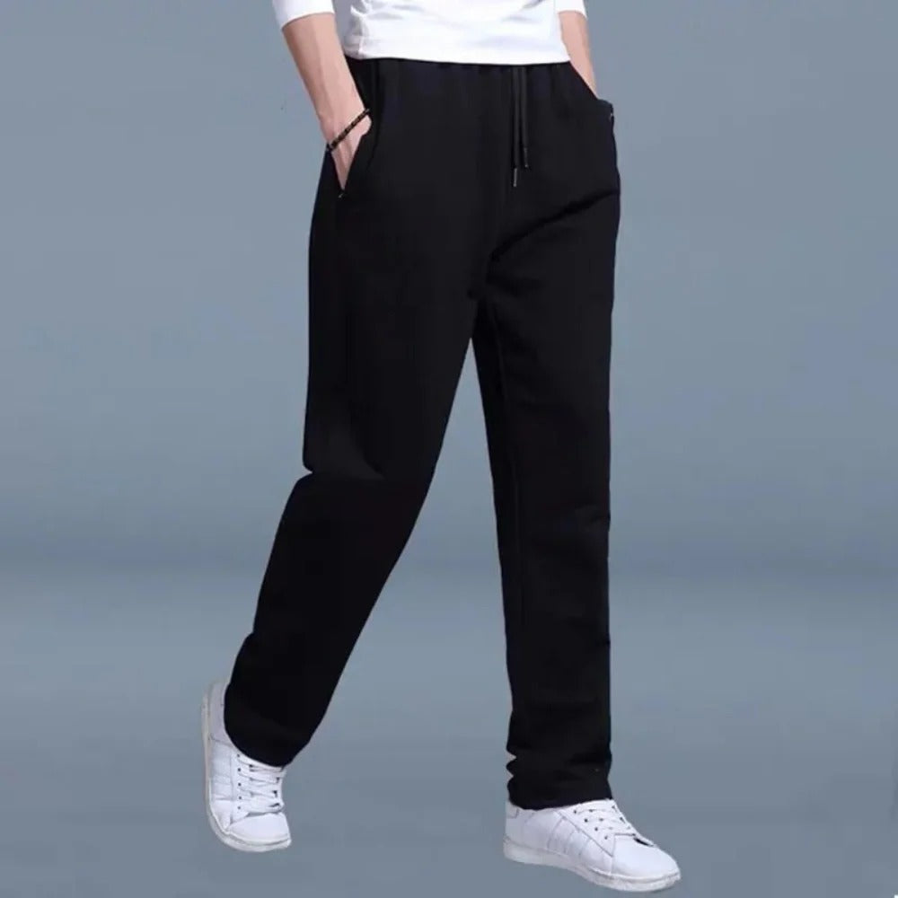 Men's gray cotton-polyester sweatpants with elastic waist and deep side pockets for everyday wear