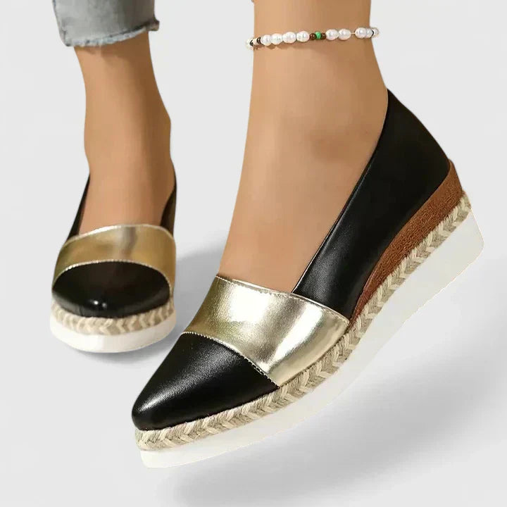 Women's beige comfort loafers with cushioned footbed, structured slip-on design for all-day comfort