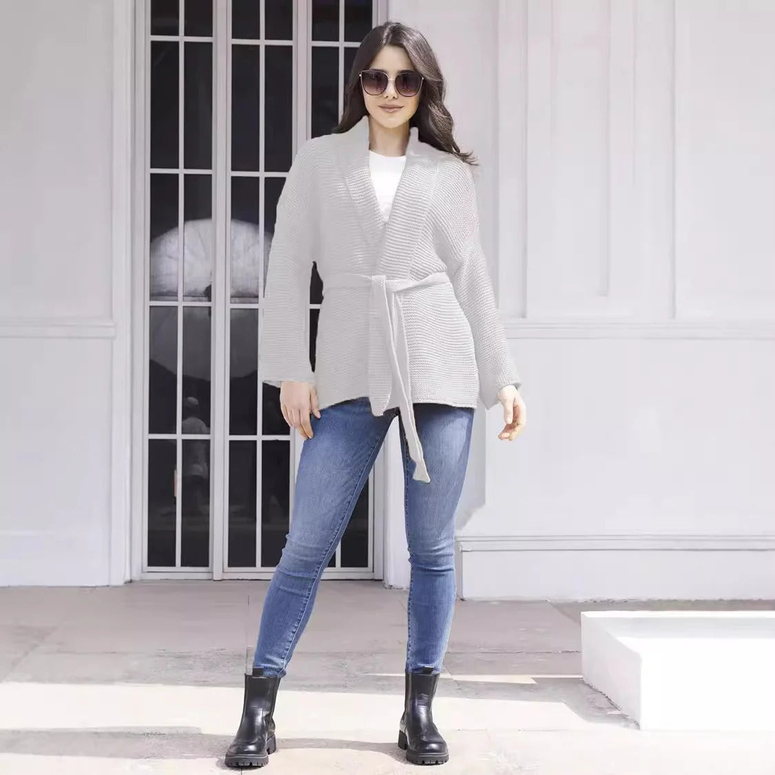 Women's ribbed knit cardigan with shawl collar, belted waist, mid-length fit in neutral tones