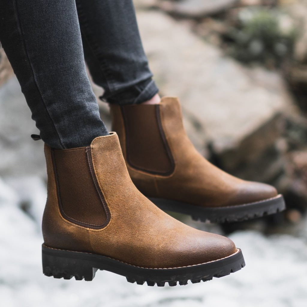 Women's black ankle boots chunky lug sole sleek upper leg-lengthening silhouette fashion-forward style
