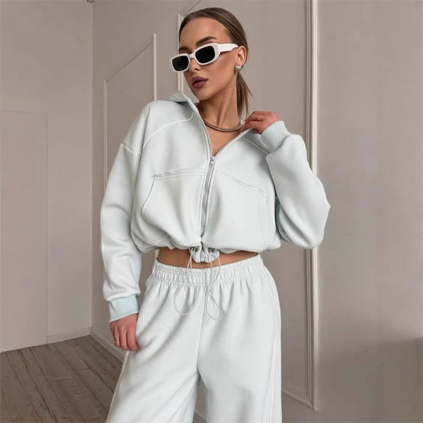 Women's oversized hoodie and pants two-piece set with zipper closure and contrast seam detailing