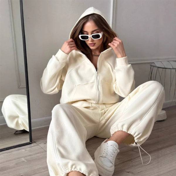 Women's oversized hoodie and pants two-piece set with zipper closure and contrast seam detailing