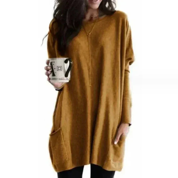 Women's oversized soft knit tunic pullover with dropped shoulders, relaxed fit, and side pockets