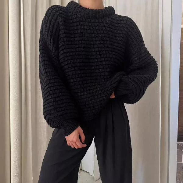Women's oversized wool blend knit sweater with high collar and ribbed texture for a cozy chic look