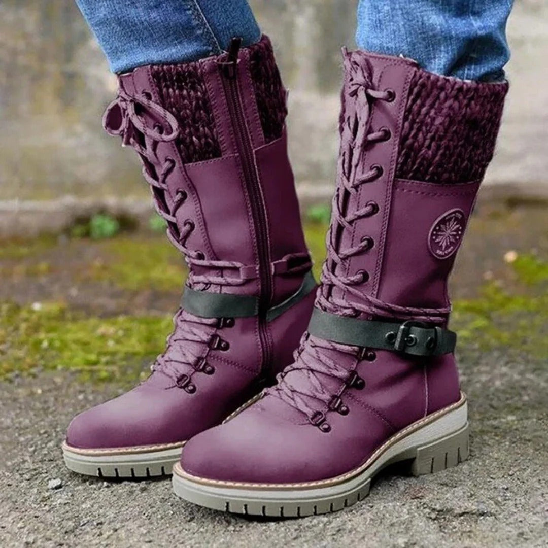Women's brown knee-high lace-up boots with cuff detail, elegant leg-lengthening silhouette