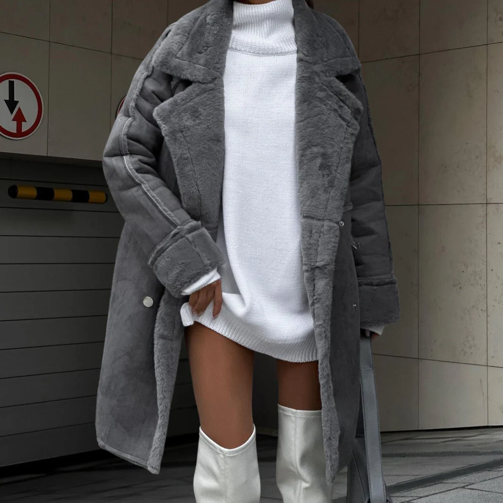 Women's oversized full-length faux fur coat with wide lapel and button front closure