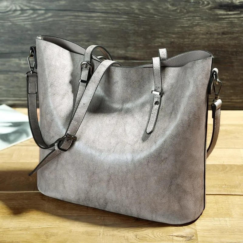 Women's vintage PU leather tote bag in rich brown with retro charm and wrinkle-resistant exterior